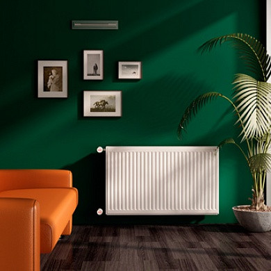 Стальной панельный радиатор STI Compact 11-500-600, боковое подключение